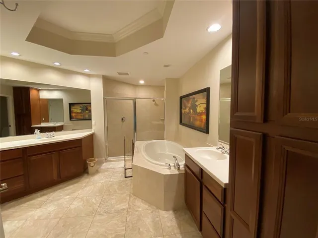 a bathroom with a shower and a bathtub