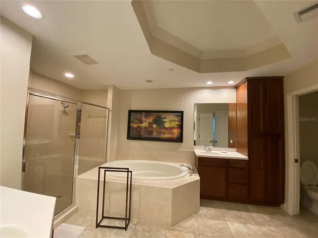 a view of a hallway with wooden shelves