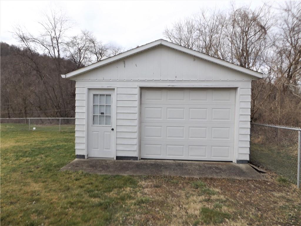438 Cottage Road Smock, PA 15480 - Photo 15 of 17 a front view of a house with a yard