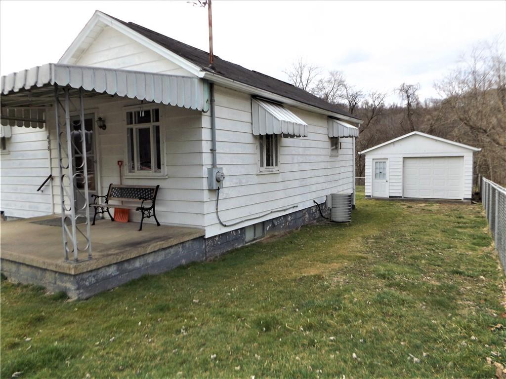 438 Cottage Road Smock, PA 15480 - Photo 2 of 17 a view of a house with a yard