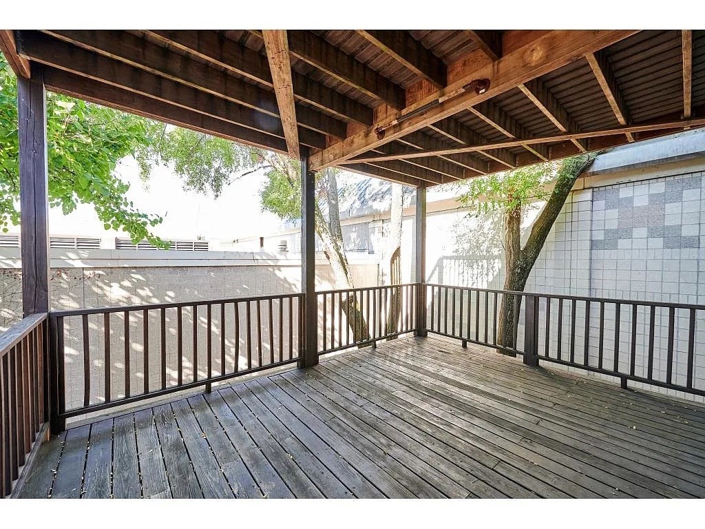 5-7 Transit Street, Unit 5 2 Boston, MA 02127 - Photo 7 of 7 a view of porch with wooden floor