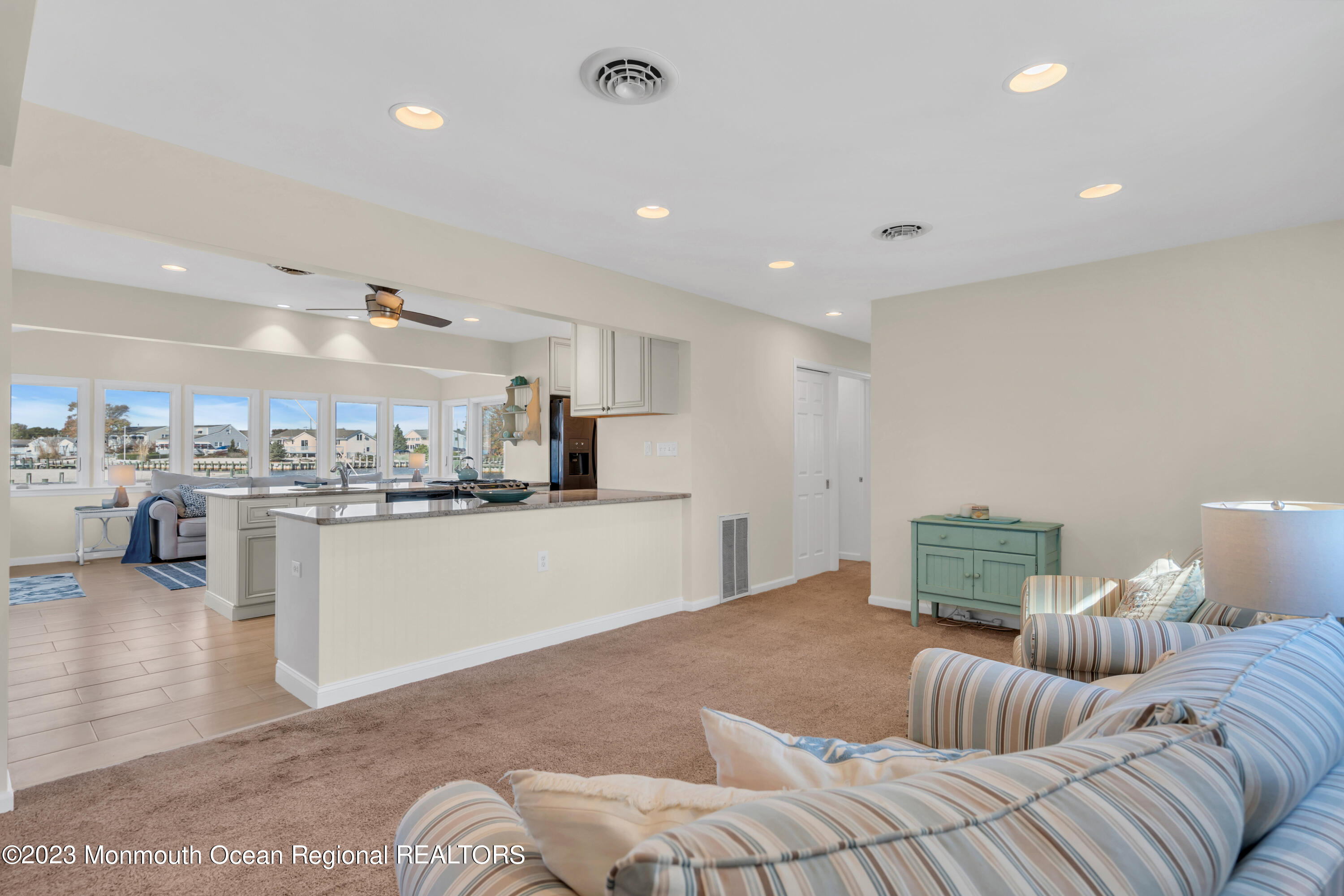 119 Caldwell Road Barnegat, NJ 08005 - Photo 13 of 51 a living room with furniture and kitchen view