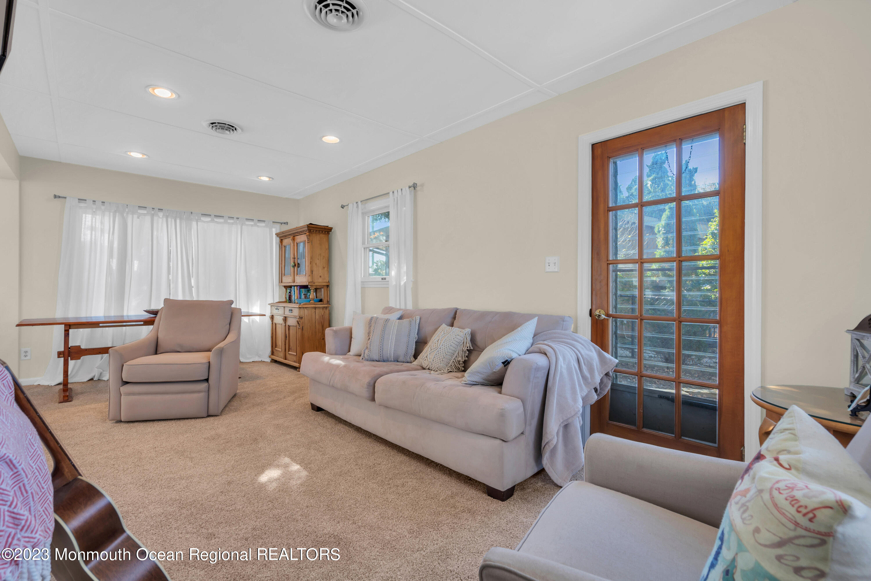 119 Caldwell Road Barnegat, NJ 08005 - Photo 17 of 51 a living room with furniture and a window