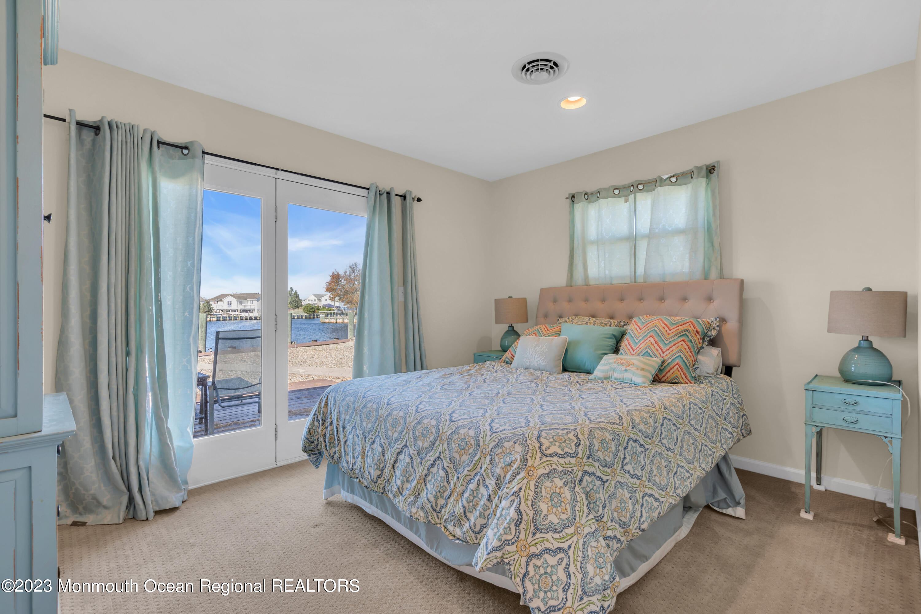 119 Caldwell Road Barnegat, NJ 08005 - Photo 19 of 51 a bedroom with a large bed and a closet