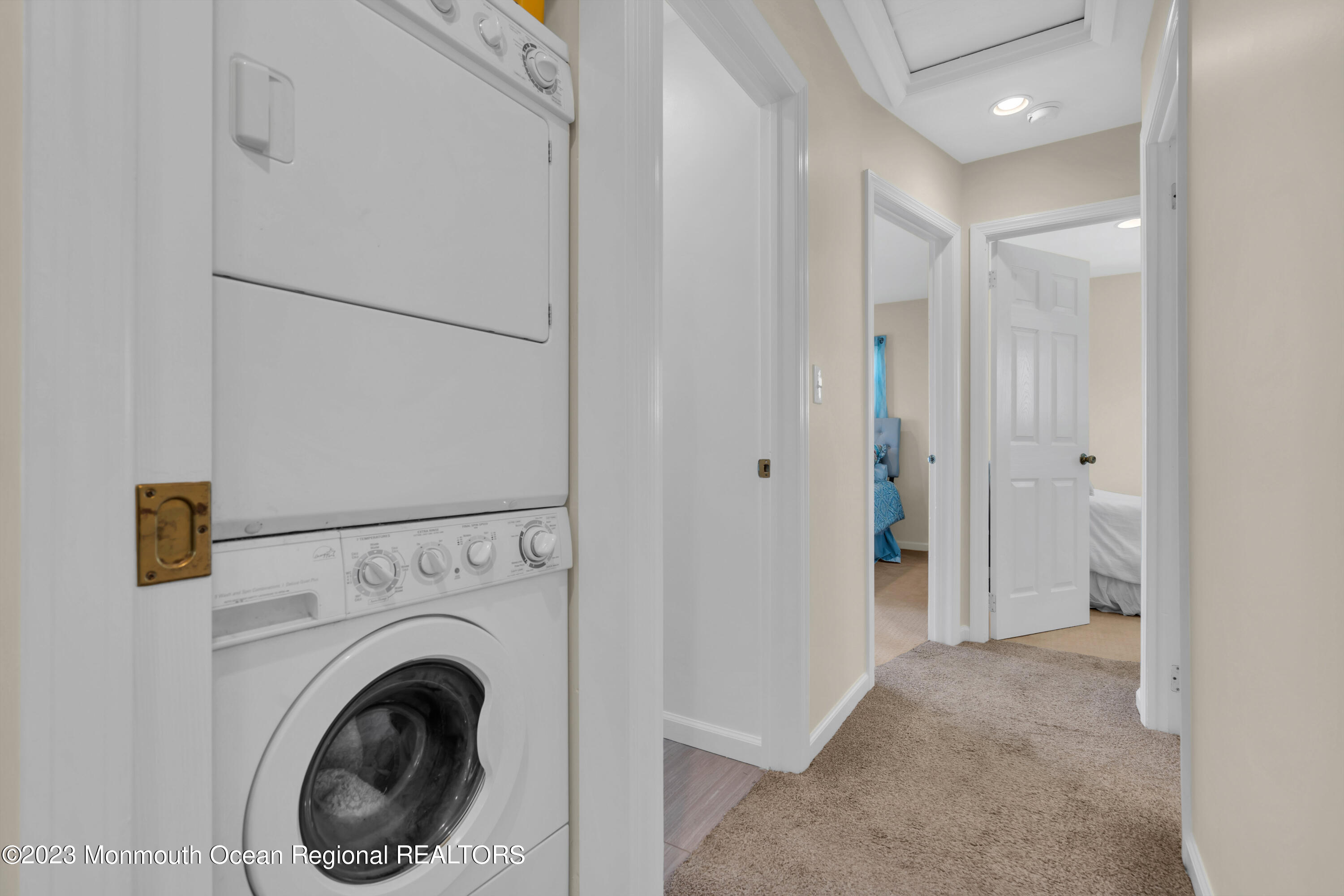 119 Caldwell Road Barnegat, NJ 08005 - Photo 23 of 51 a view of a hallway with washer and dryer