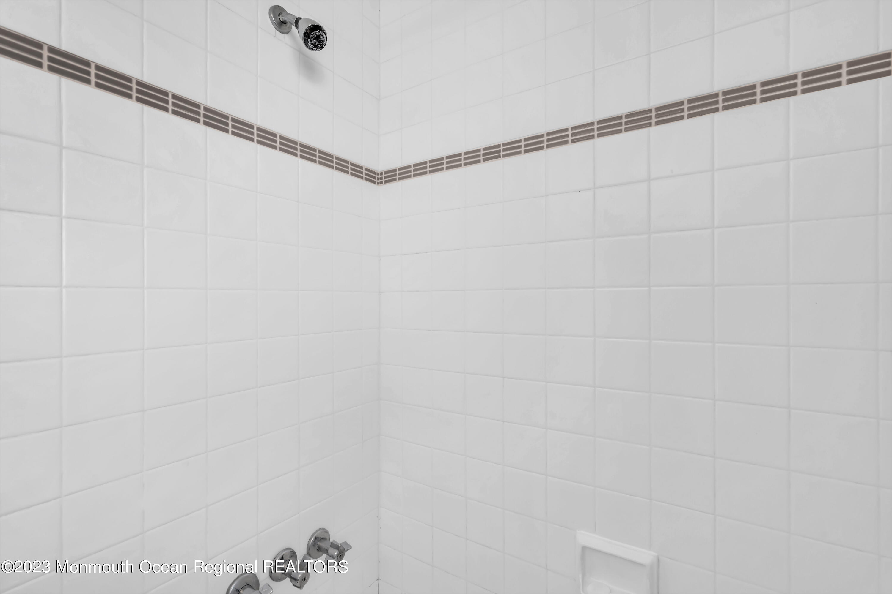 119 Caldwell Road Barnegat, NJ 08005 - Photo 25 of 51 a bathroom with a shower and a shower head