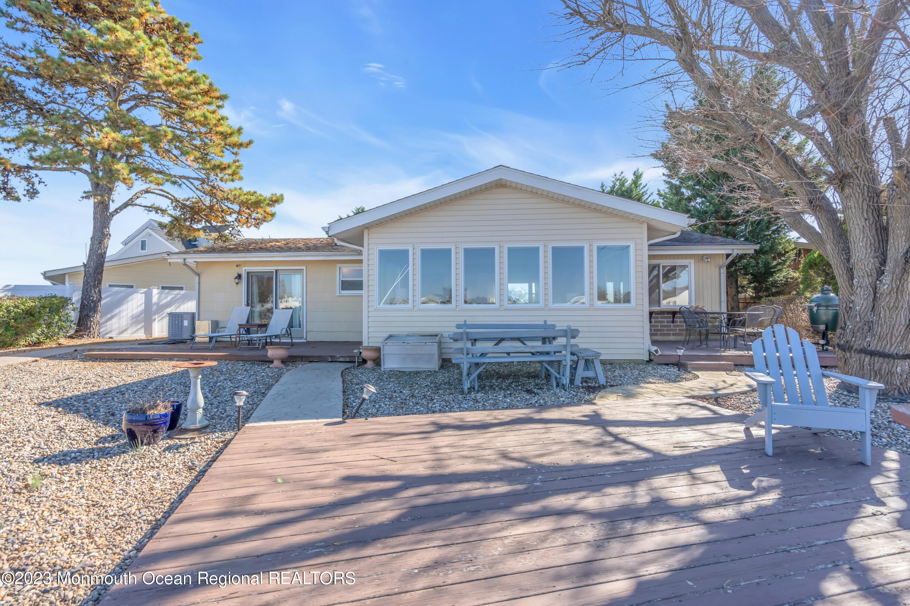 119 Caldwell Road Barnegat, NJ 08005 - Photo 27 of 51 a front view of a house with balcony and trees