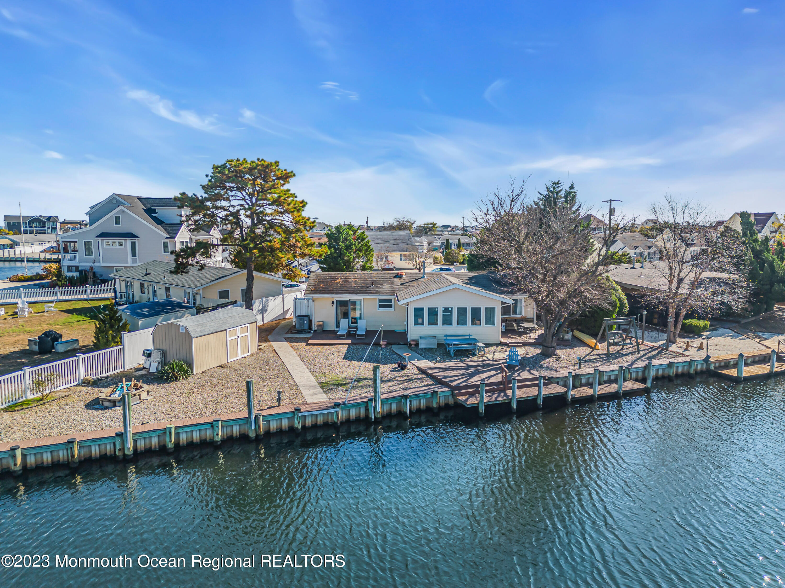 119 Caldwell Road Barnegat, NJ 08005 - Photo 43 of 51 a view of a lake with a house swimming pool and outdoor space