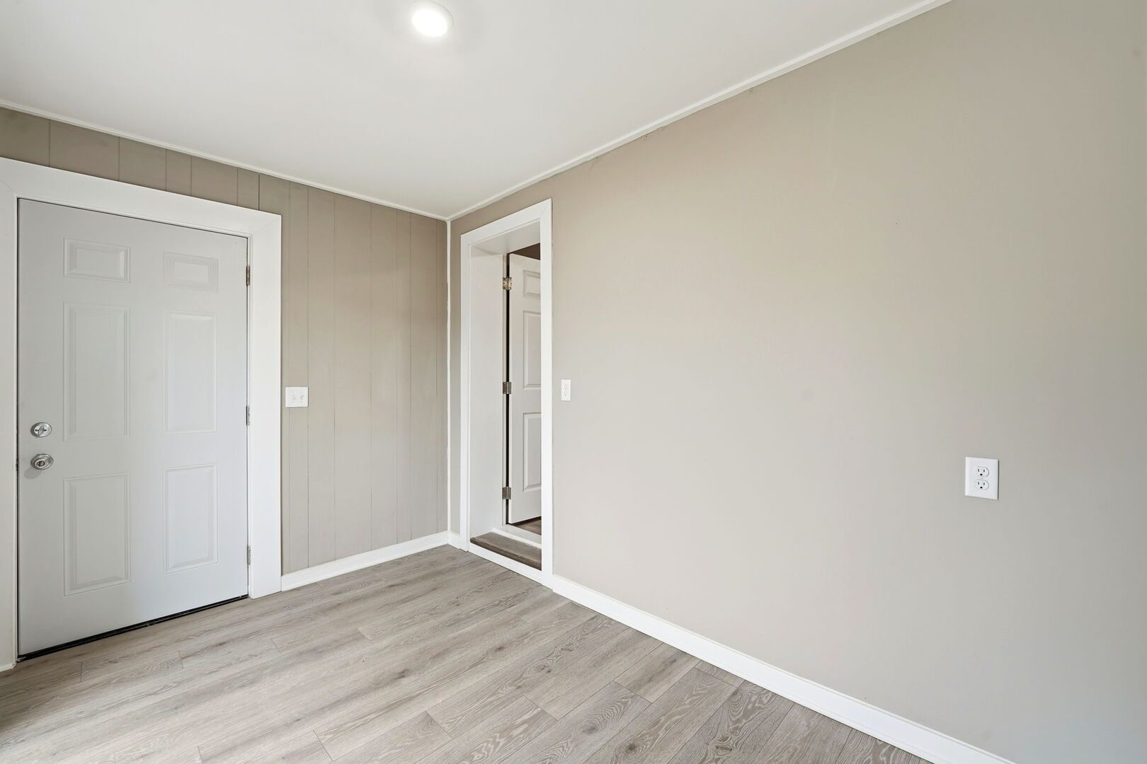 1217 North Harding Avenue Chicago, IL 60651 - Photo 15 of 45 a view of an empty room with wooden floor