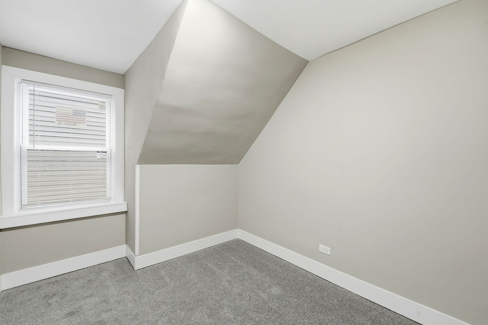 1217 North Harding Avenue Chicago, IL 60651 - Photo 20 of 45 an empty room with a window