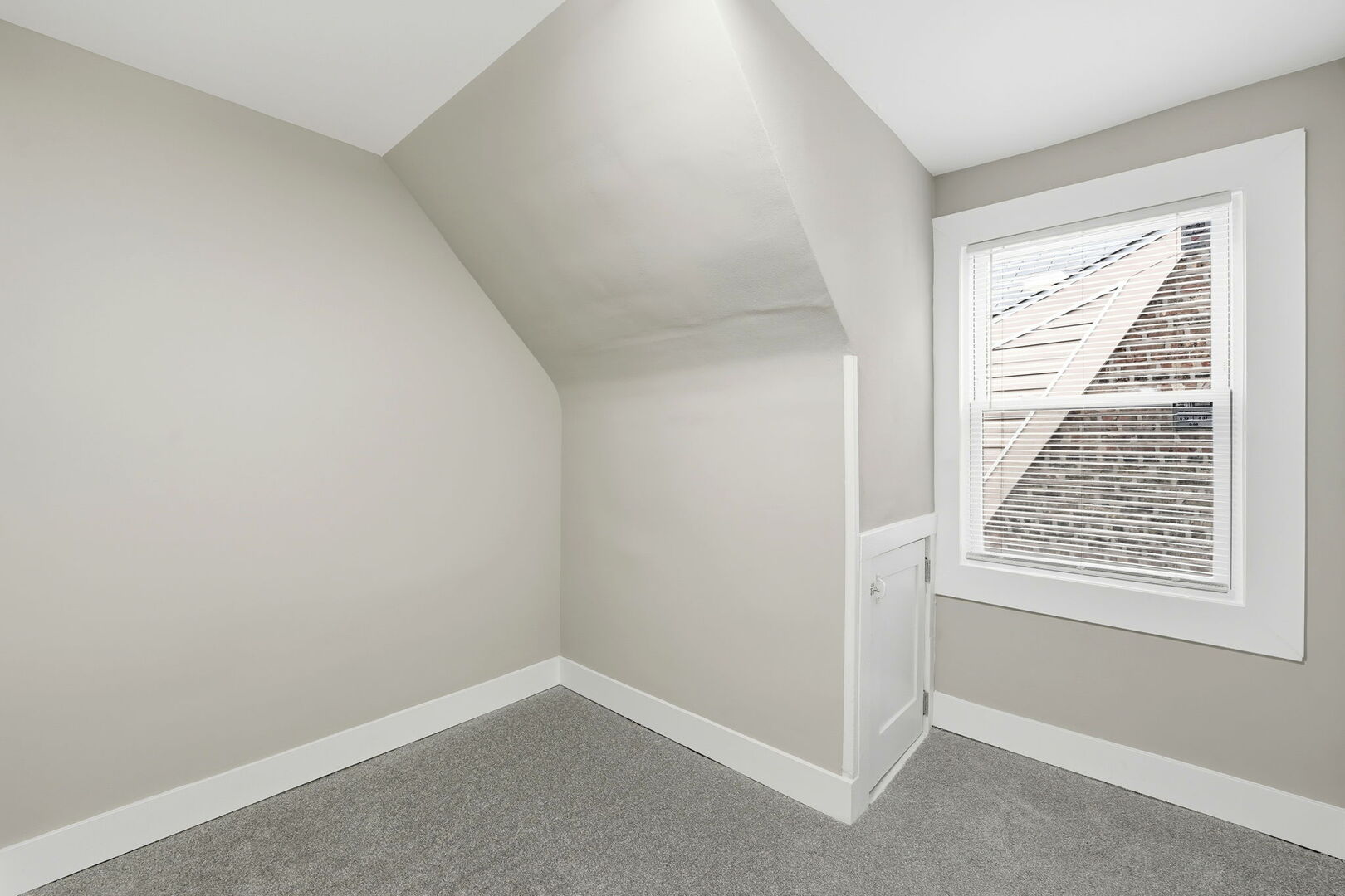 1217 North Harding Avenue Chicago, IL 60651 - Photo 22 of 45 a view of an empty room with a window