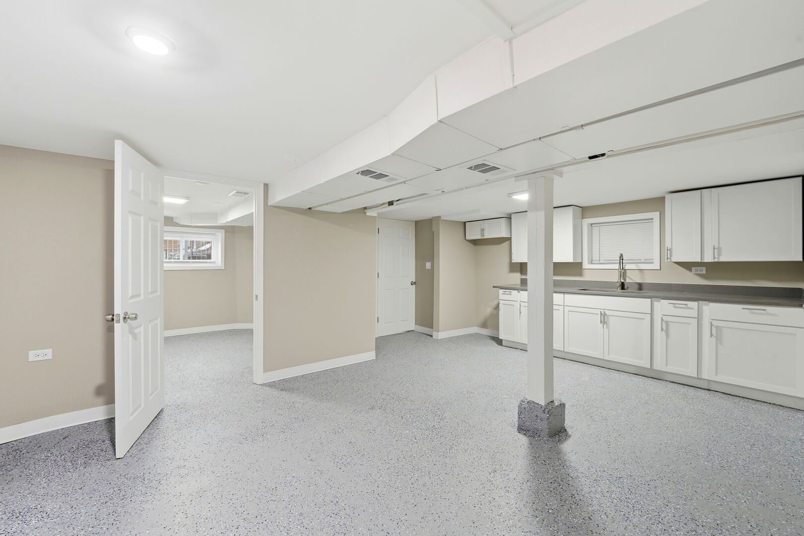 1217 North Harding Avenue Chicago, IL 60651 - Photo 31 of 45 a view of a kitchen with refrigerator and white cabinets