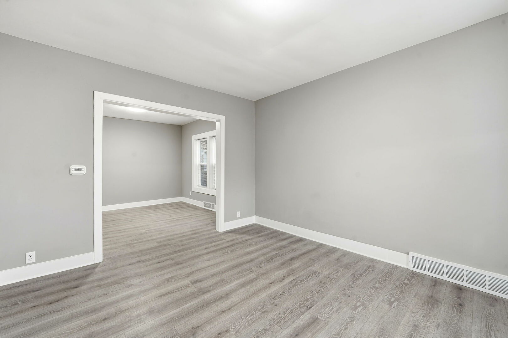 1217 North Harding Avenue Chicago, IL 60651 - Photo 4 of 45 wooden floor in an empty room