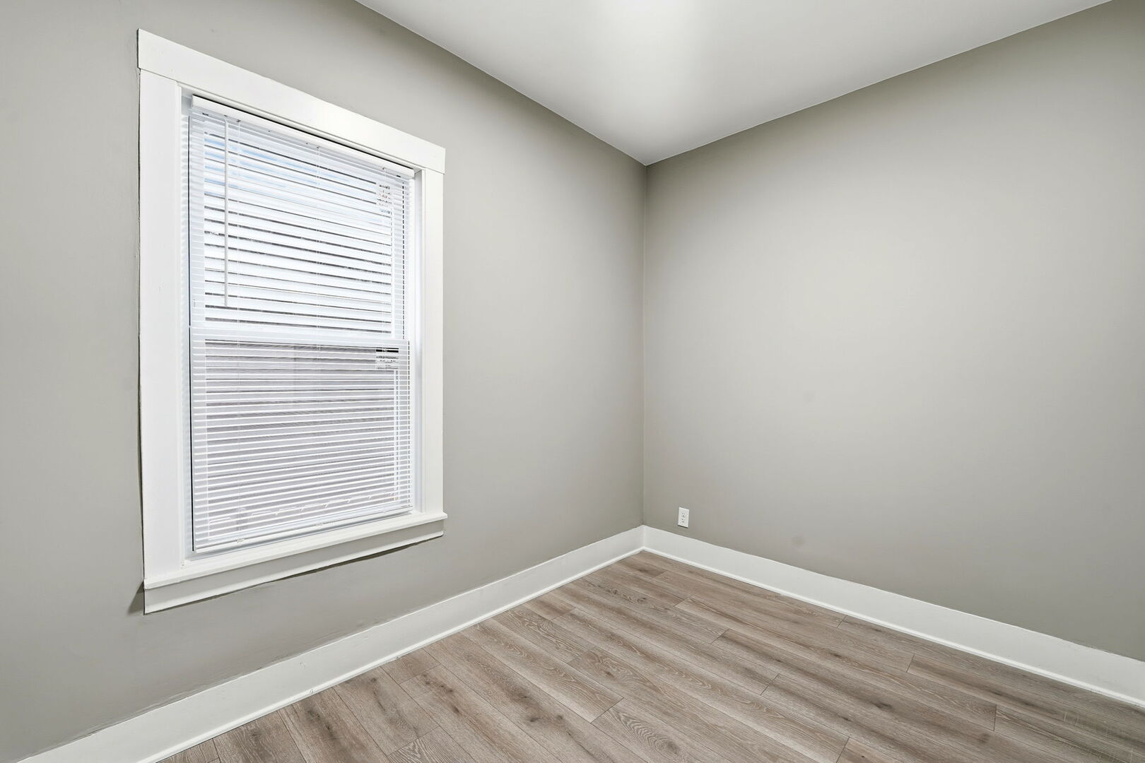 1217 North Harding Avenue Chicago, IL 60651 - Photo 8 of 45 an empty room with a window