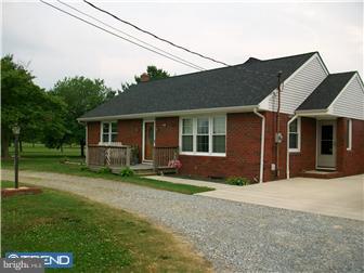 140 Harris Road Mannington, NJ 08079 - Photo 1 of 12 a front view of a house with garden