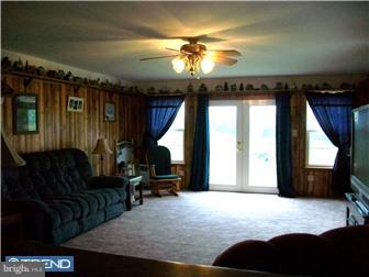 140 Harris Road Mannington, NJ 08079 - Photo 3 of 12 a living room with furniture and a large window