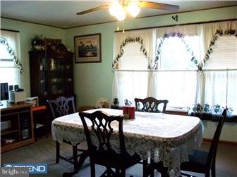 140 Harris Road Mannington, NJ 08079 - Photo 6 of 12 a view of a dining room with furniture and window