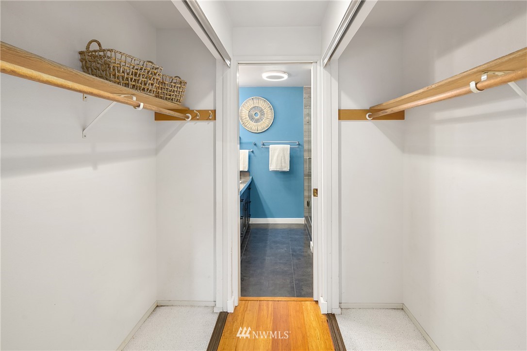 116 11th Avenue East, Unit 402 Seattle, WA 98102 - Photo 12 of 22 a view of hallway with shower and bathtub