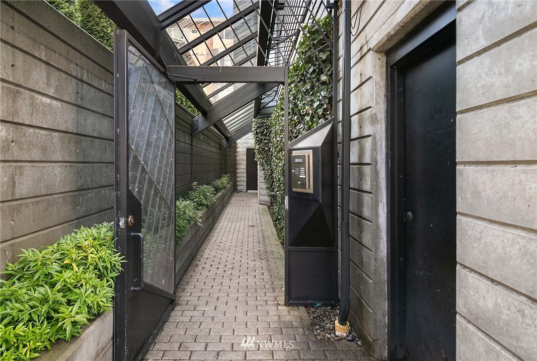 116 11th Avenue East, Unit 402 Seattle, WA 98102 - Photo 2 of 22 a view of a pathway both side of house