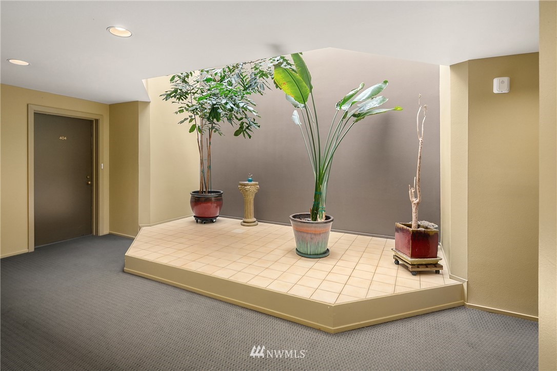116 11th Avenue East, Unit 402 Seattle, WA 98102 - Photo 21 of 22 a vase of flowers sitting on a table