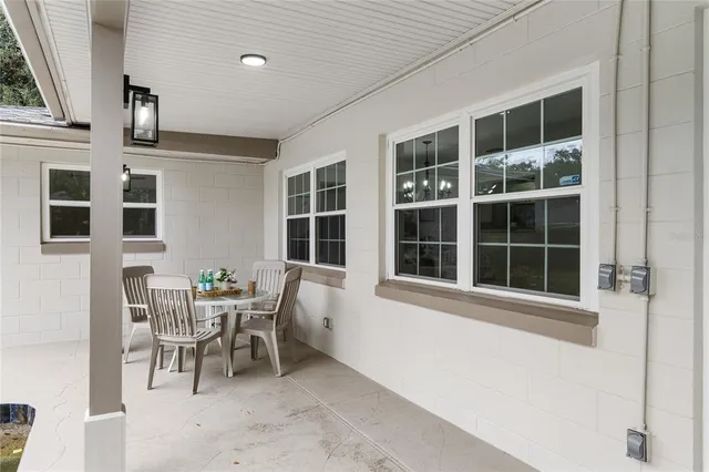 a view of a swimming pool with a yard