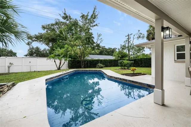 a view of outdoor space yard and swimming pool