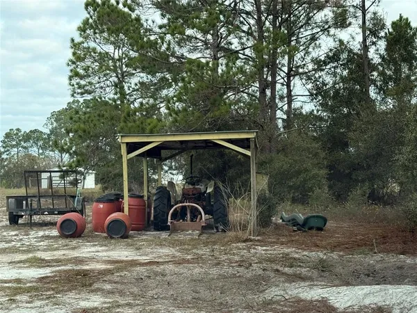 a view of a lake with a yard