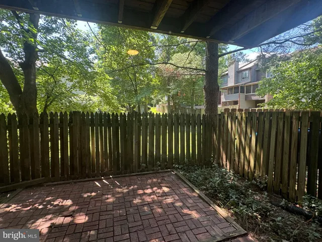 a view of backyard with green space
