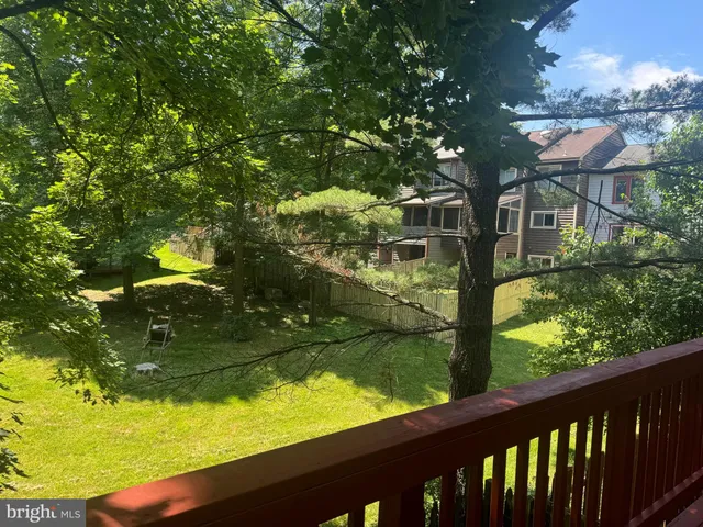 a view of swimming pool from a balcony