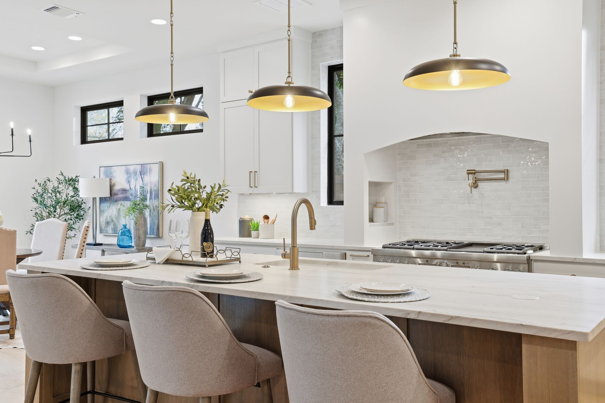 2908 Stoneway Drive Austin, TX 78757 - Photo 11 of 35 a kitchen with a table chairs sink and microwave
