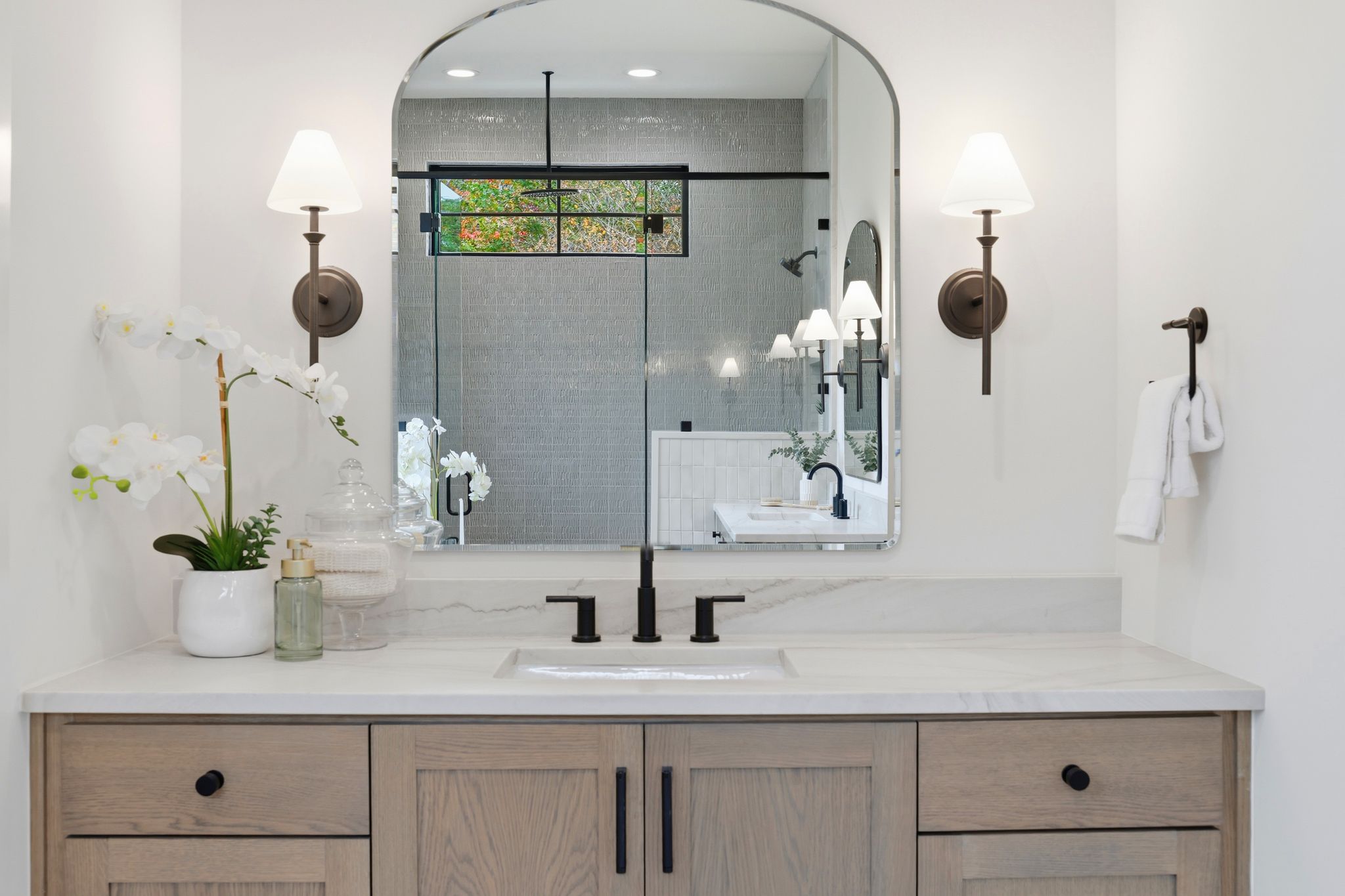2908 Stoneway Drive Austin, TX 78757 - Photo 19 of 35 a bathroom with a sink and mirror