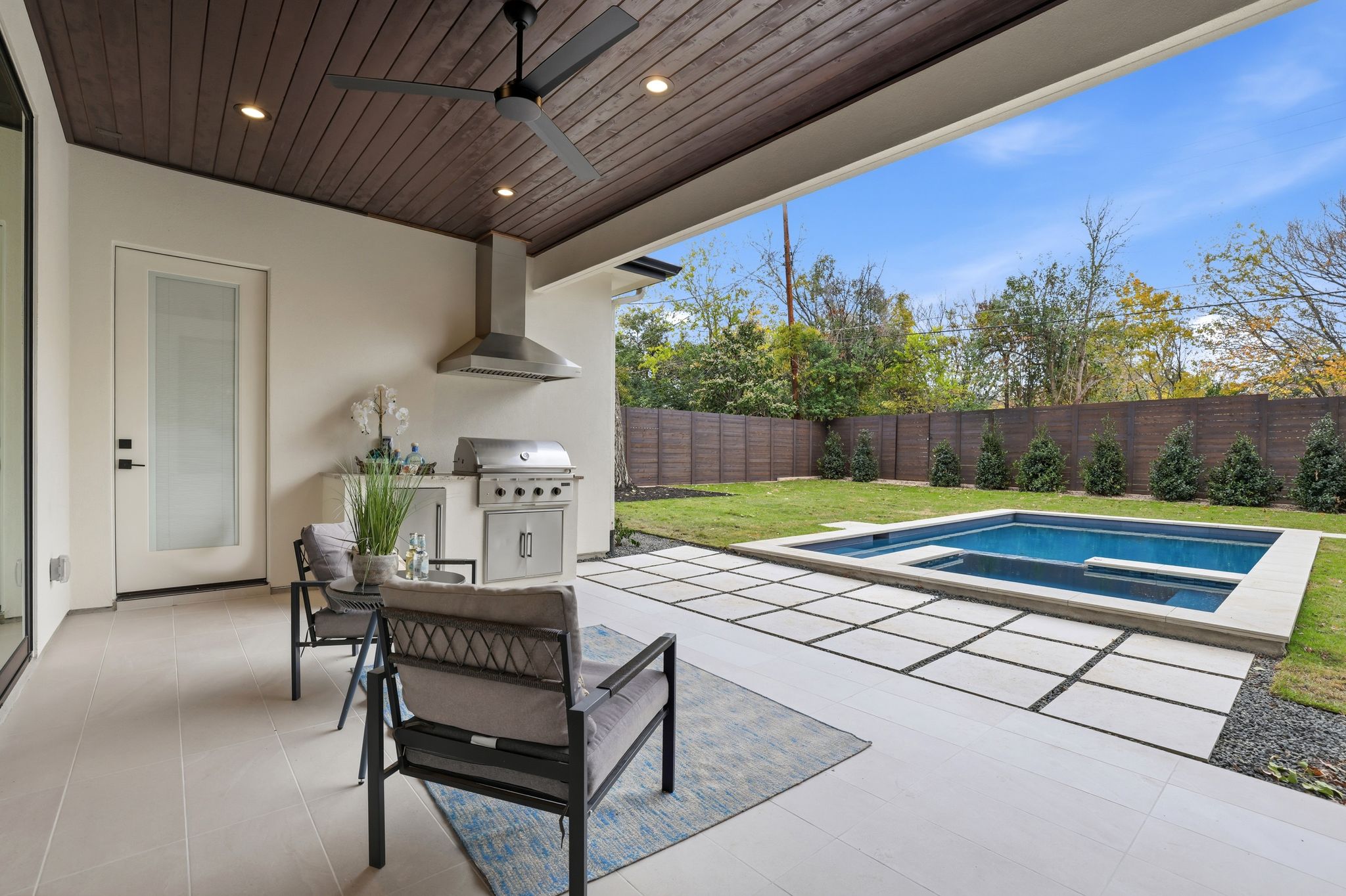 2908 Stoneway Drive Austin, TX 78757 - Photo 28 of 35 a view of a chairs and table in the patio