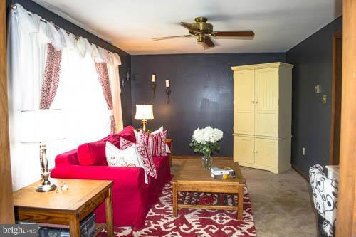 7610 Pindell School Road Fulton, MD 20759 - Photo 5 of 30 Living Room With Neutral Carpeting