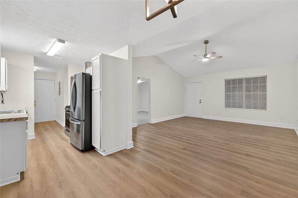 37 Peach Forest Way Douglasville, GA 30134 - Photo 16 of 30 a view of a kitchen with a sink and refrigerator