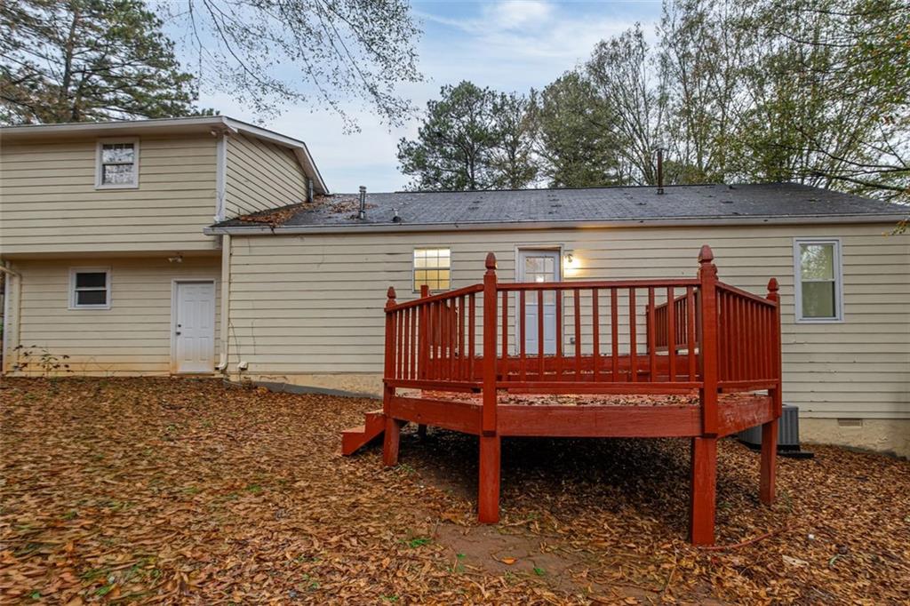 37 Peach Forest Way Douglasville, GA 30134 - Photo 22 of 30 a view of a bench in the roof deck