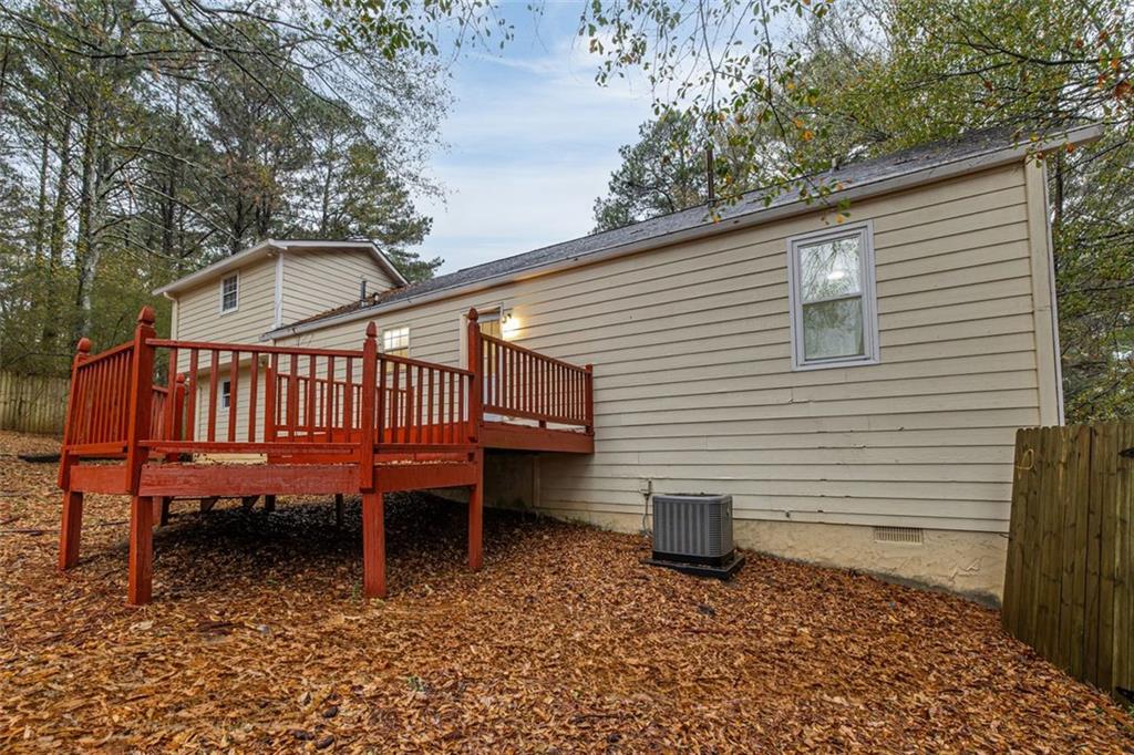 37 Peach Forest Way Douglasville, GA 30134 - Photo 25 of 30 a view of a chair in backyard of the house