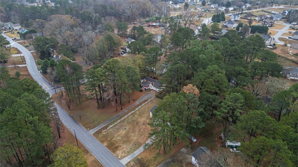 37 Peach Forest Way Douglasville, GA 30134 - Photo 29 of 30 an aerial view of a house with outdoor space and street view