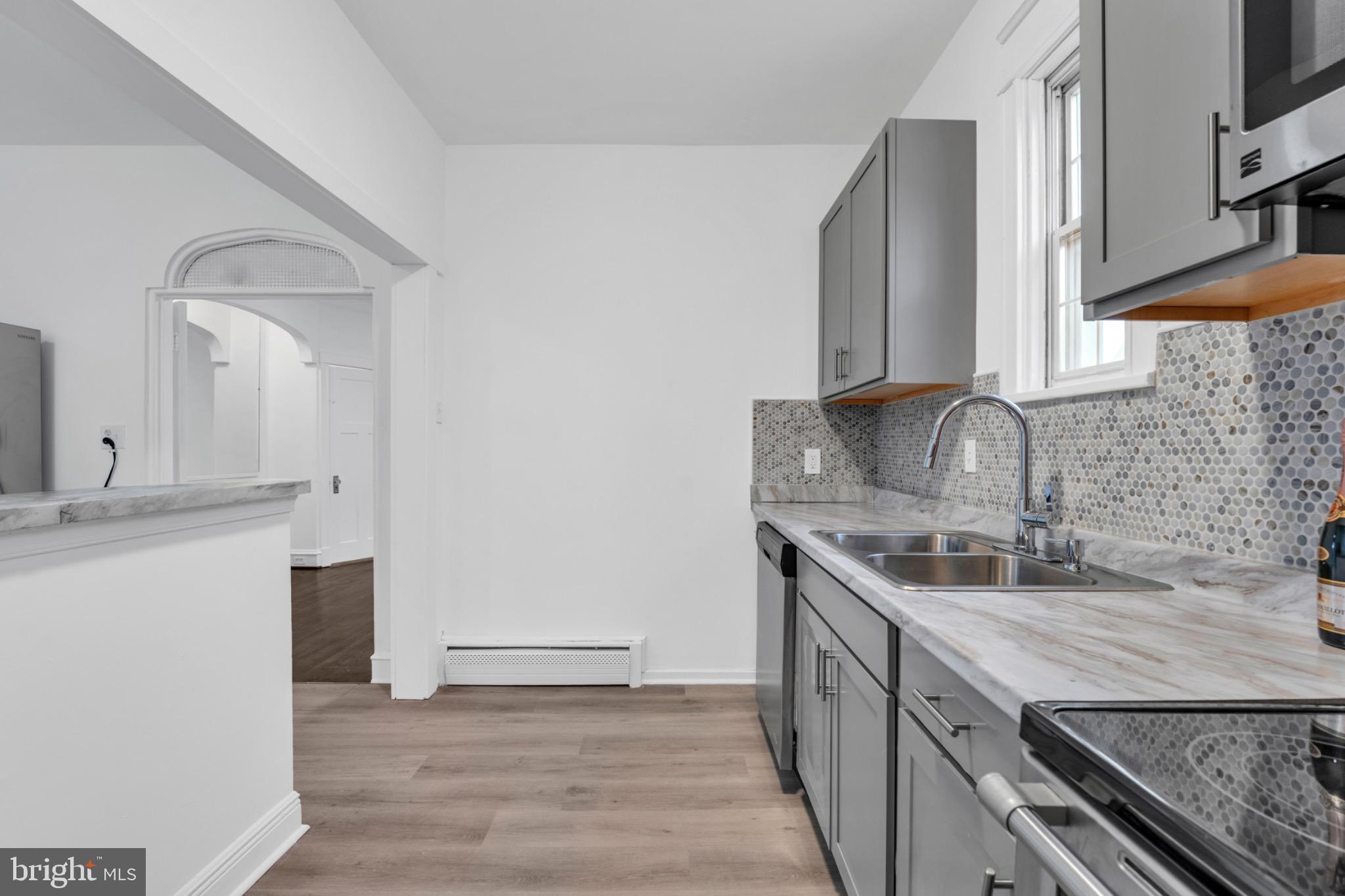 2219 Chesterfield Avenue Baltimore, MD 21213 - Photo 13 of 30 Modern kitchen with sleek finishes.