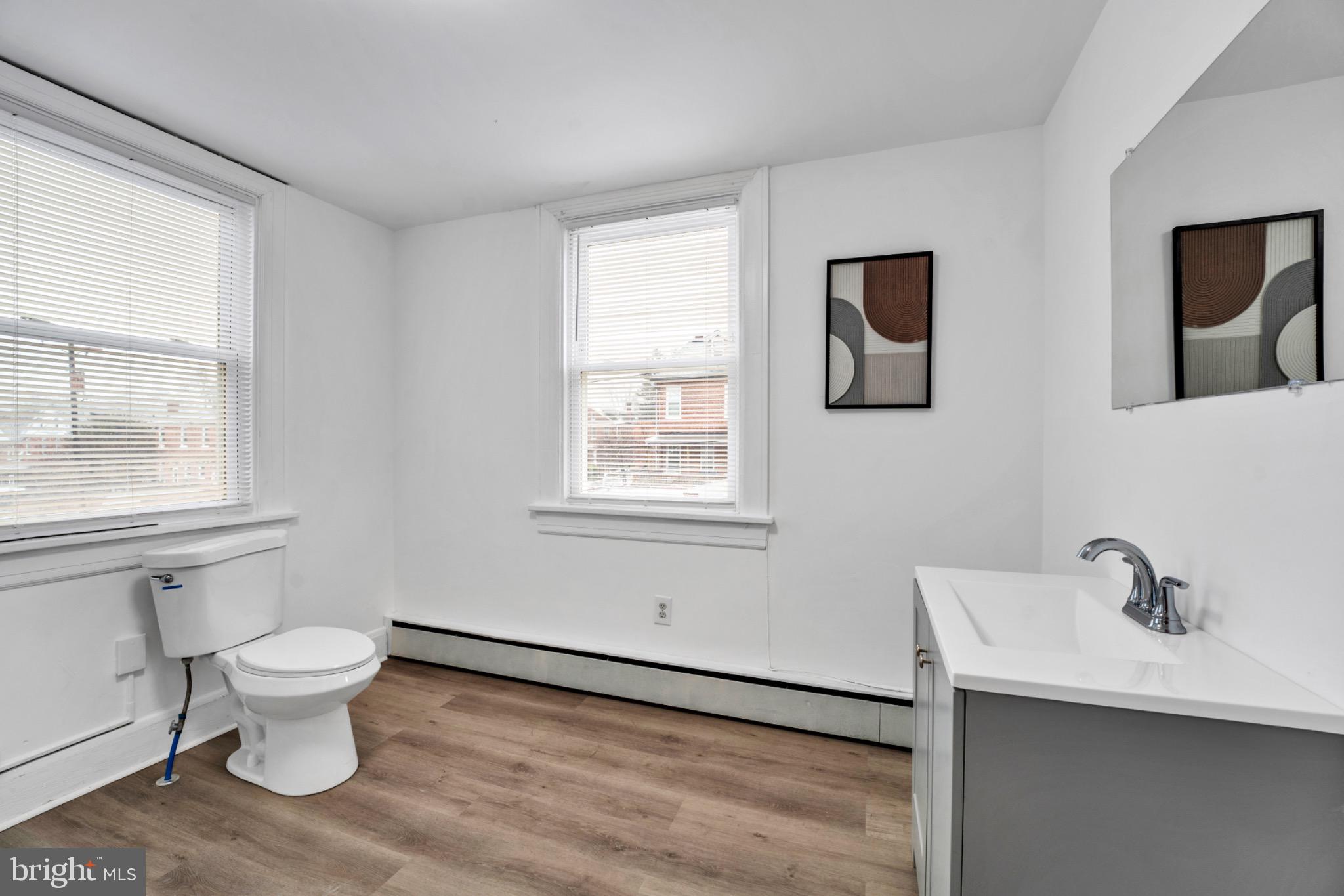 2219 Chesterfield Avenue Baltimore, MD 21213 - Photo 22 of 30 Bright and airy modern bathroom retreat.