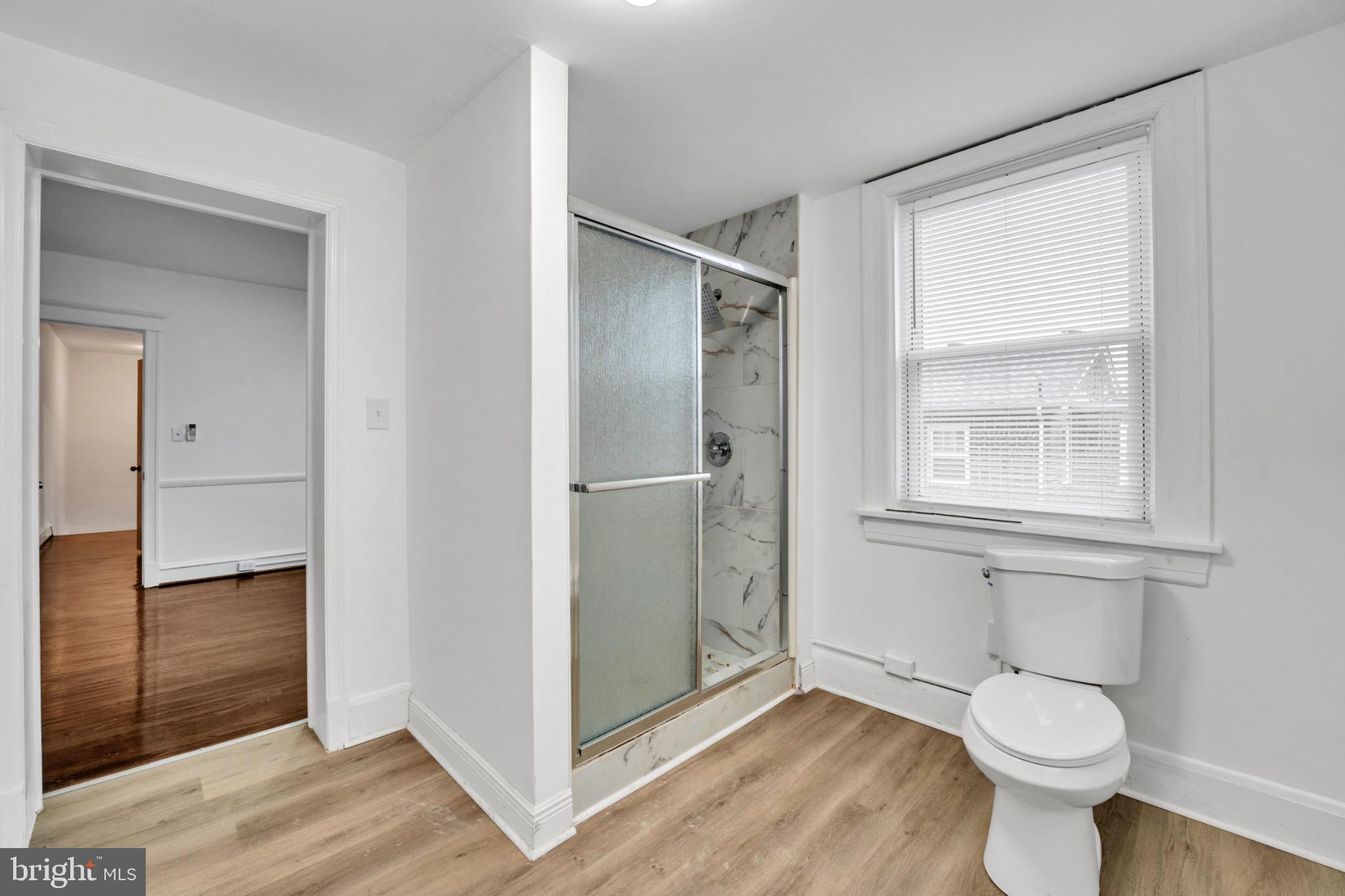 2219 Chesterfield Avenue Baltimore, MD 21213 - Photo 23 of 30 Modern bathroom with natural light.