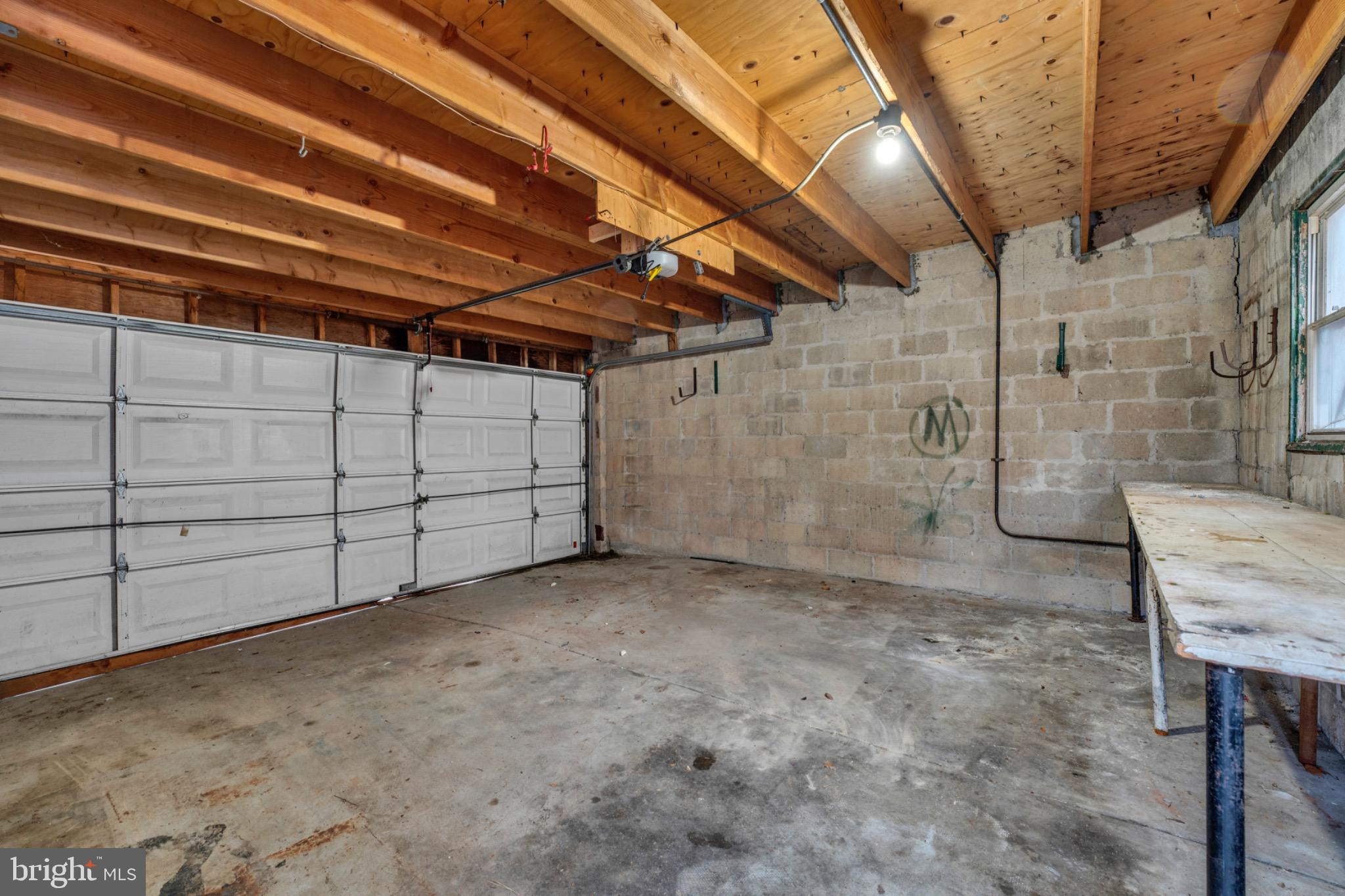 2219 Chesterfield Avenue Baltimore, MD 21213 - Photo 30 of 30 Spacious garage with rustic charm.