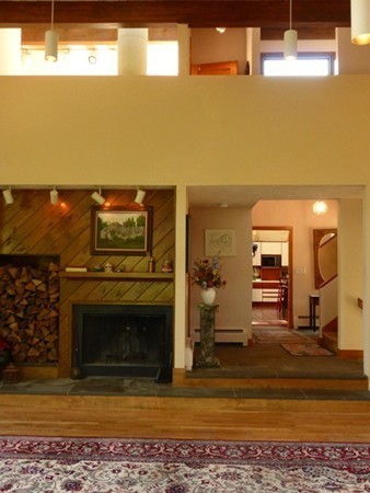 425 Taylor Road Stow, MA 01775 - Photo 17 of 28 a view of a living room with a fireplace