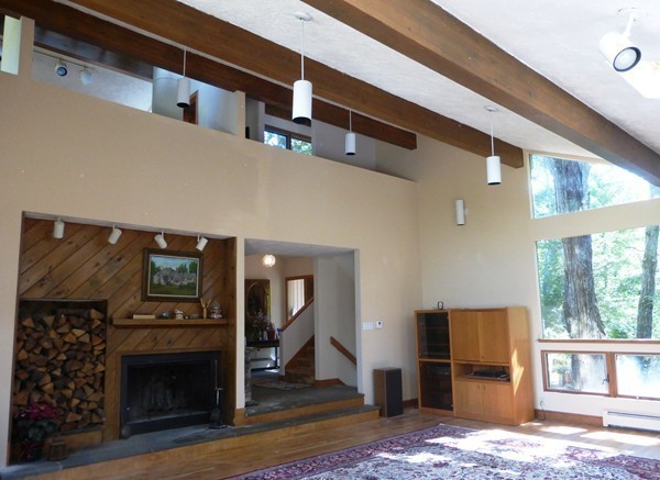 425 Taylor Road Stow, MA 01775 - Photo 18 of 28 a view of living room with furniture and a fireplace