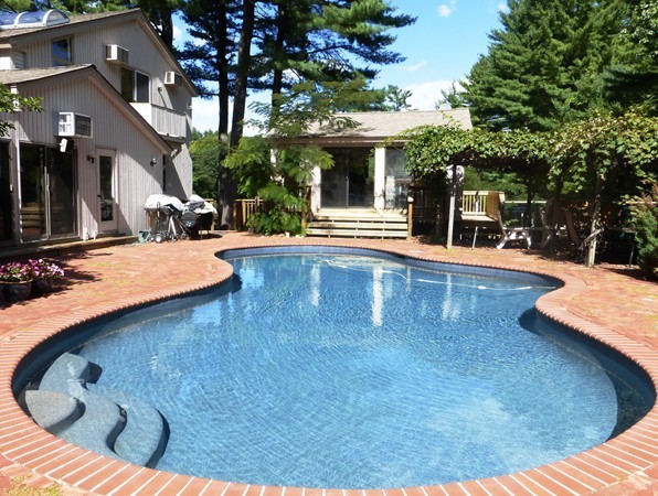 425 Taylor Road Stow, MA 01775 - Photo 4 of 28 a view of a house with swimming pool