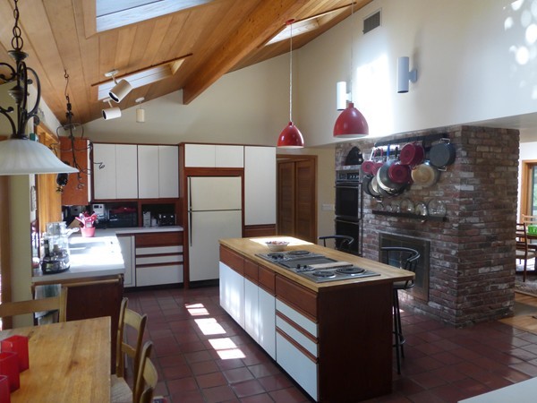 425 Taylor Road Stow, MA 01775 - Photo 9 of 28 a kitchen that has a lot of cabinets in it