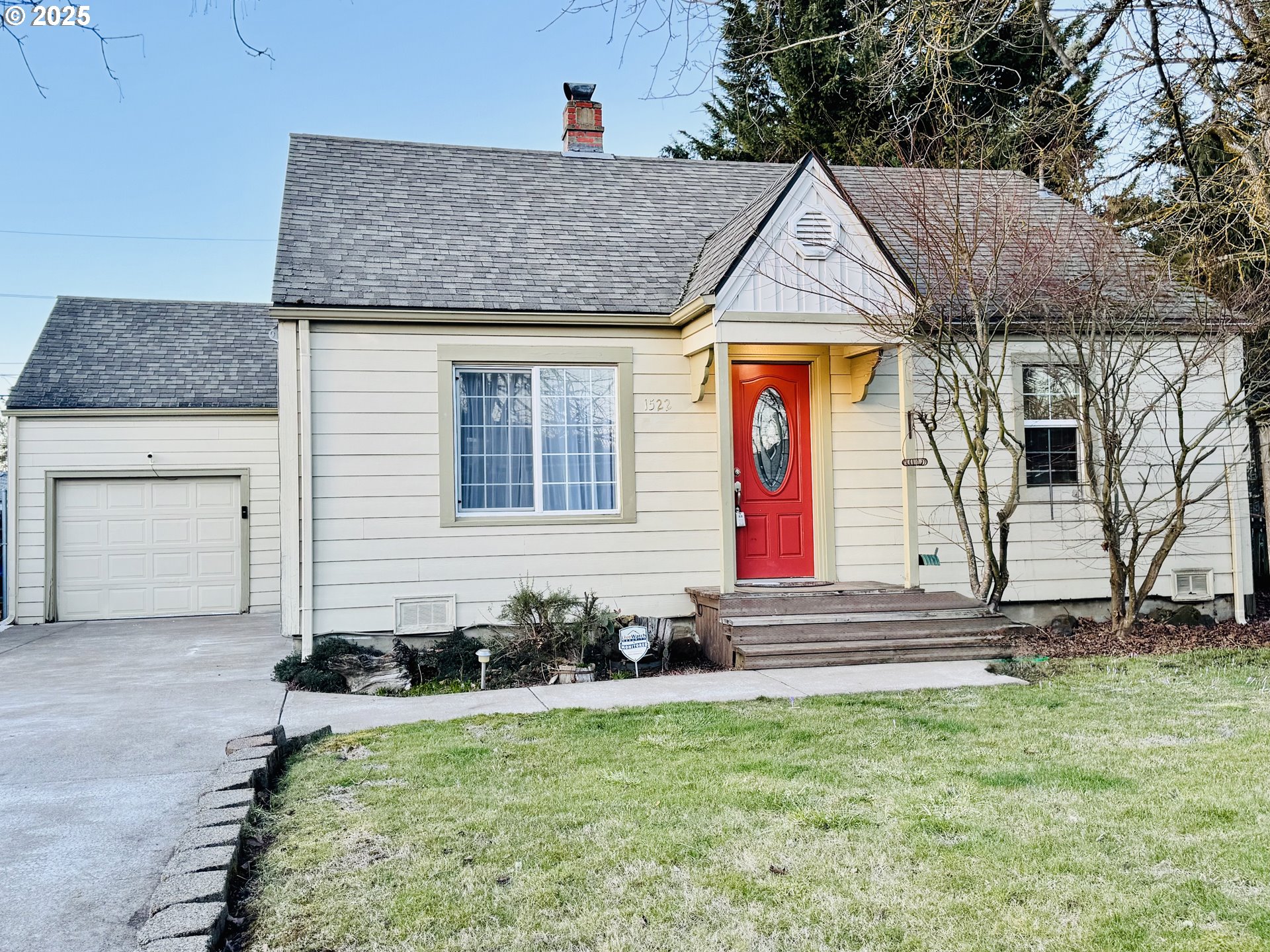 1522 B Street Springfield, OR 97477 - Photo 1 of 22 a front view of a house with yard