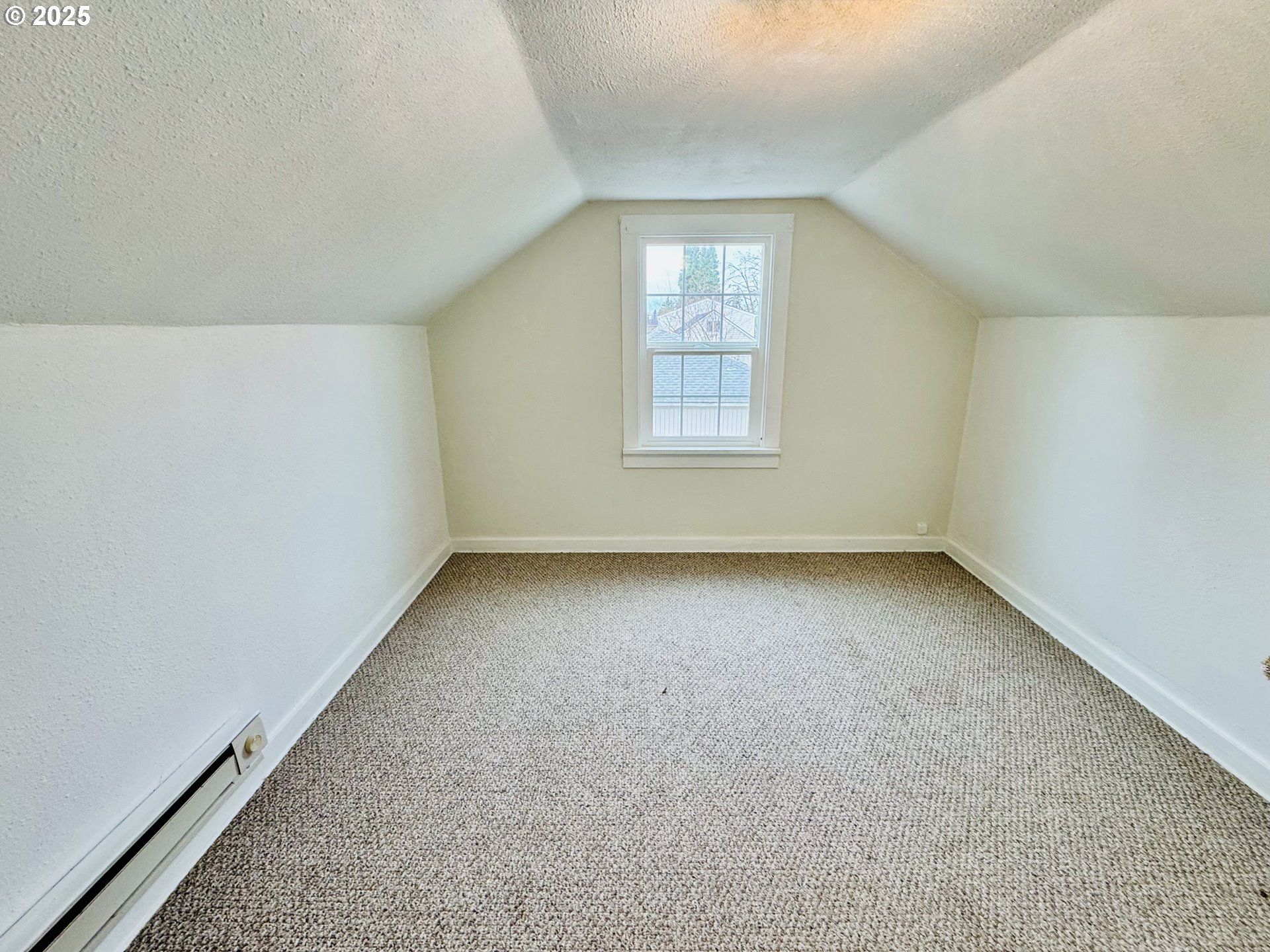 1522 B Street Springfield, OR 97477 - Photo 15 of 22 an empty room with a window