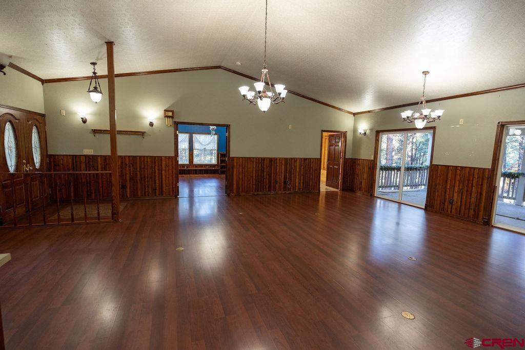 19 Pine Cone Circle Bayfield, CO 81122 - Photo 13 of 31 an open kitchen view with wooden floor and chandelier