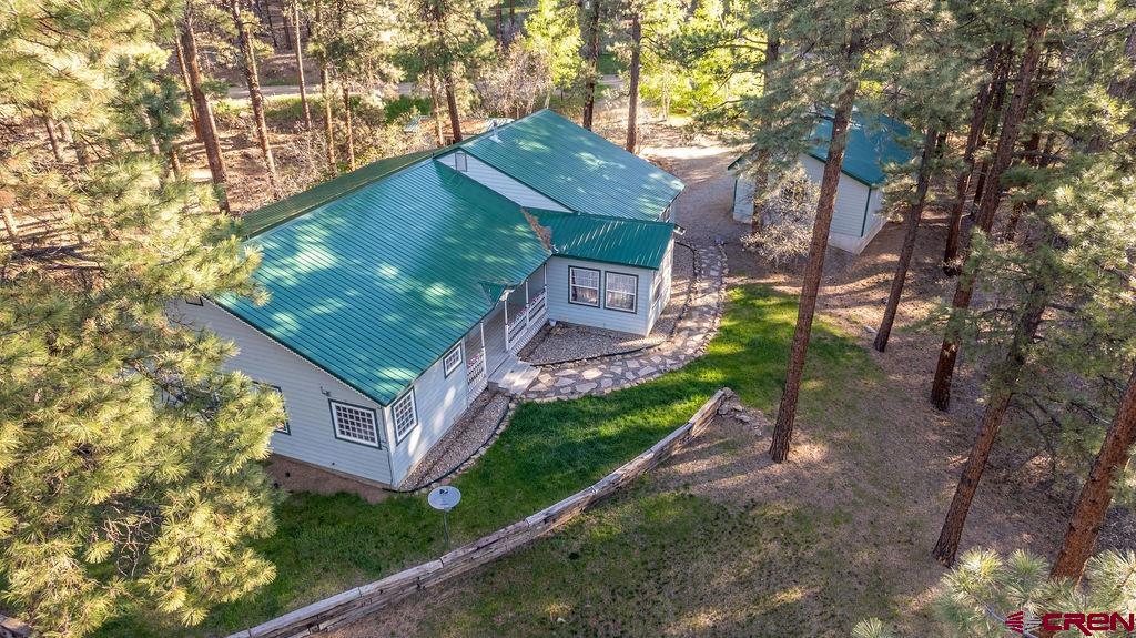 19 Pine Cone Circle Bayfield, CO 81122 - Photo 25 of 31 a view of a house with a yard