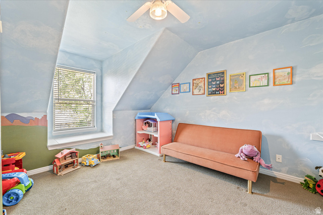 246 West Mount Charm Road Toquerville, UT 84774 - Photo 31 of 70 Recreation room featuring vaulted ceiling, carpet, and a ceiling fan